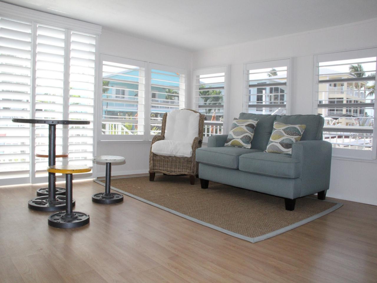 Traditional Wood Shutters 19 Sliding glass doors and windows with plantation shutters