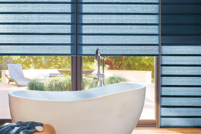 Duette Honeycomb Shades calypso livingroom model Vignette Modern Roman Shades