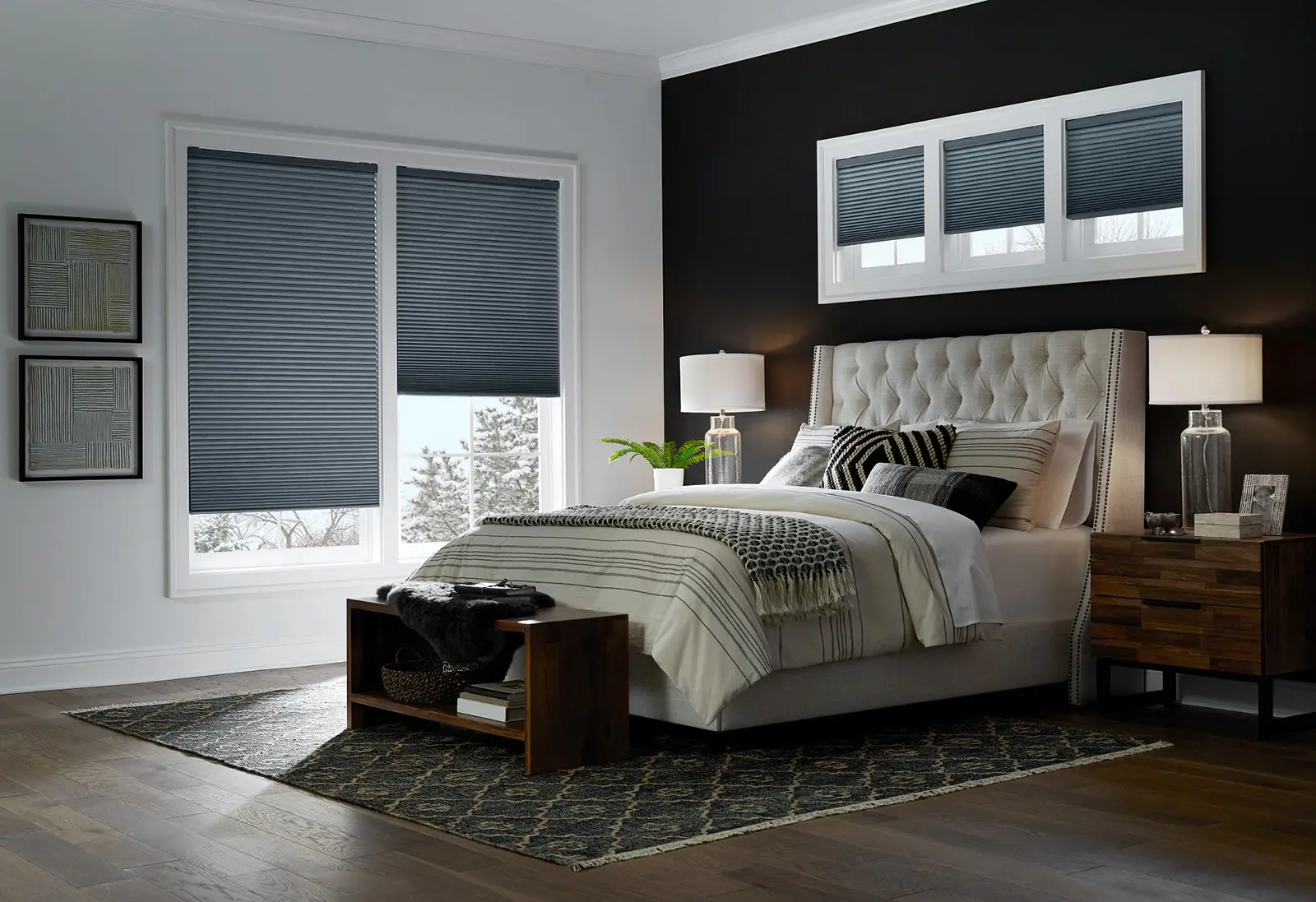 Navy honeycomb shades on bedroom windows