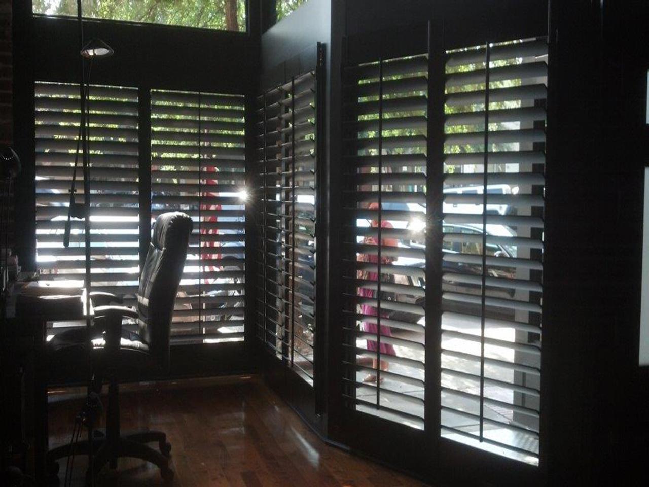 Office with stained interior shutters