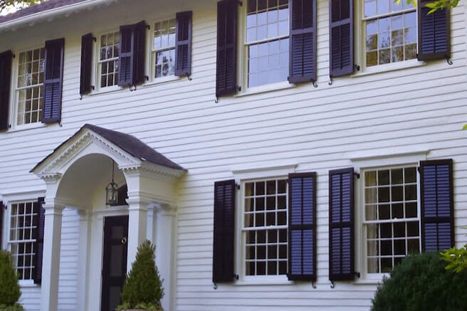 Storm Louvered Shutters on a home
