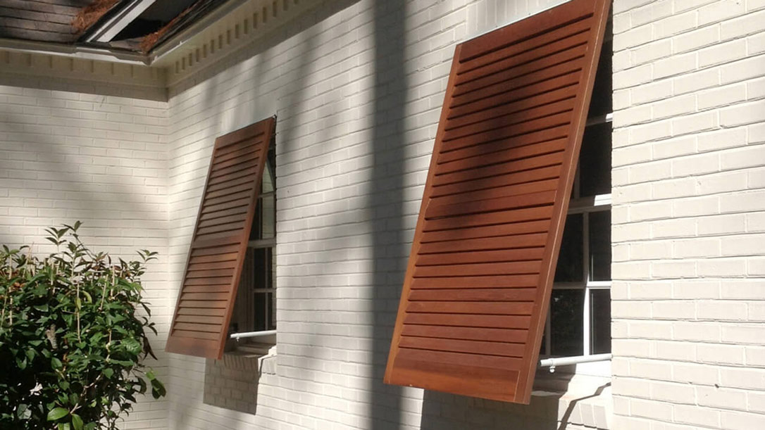 living room 2 exterior Bahama shutters