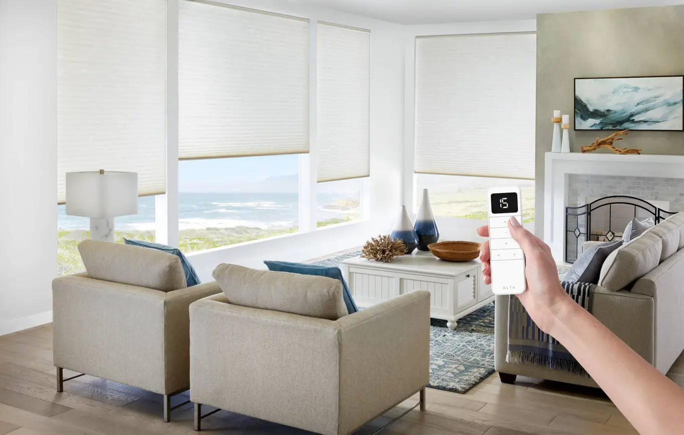 living room with automated honeycomb shades